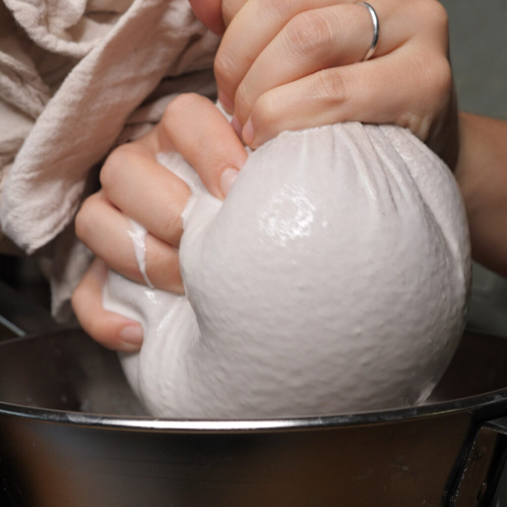 Squeezing Black Walnut Milk To Filter